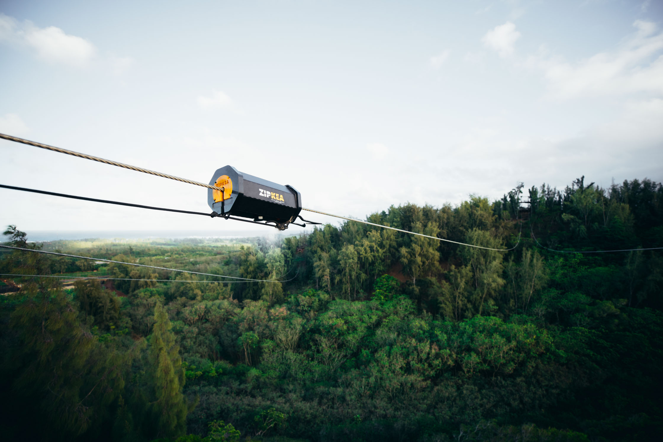 Hackwell team inspecting zipline equipment
